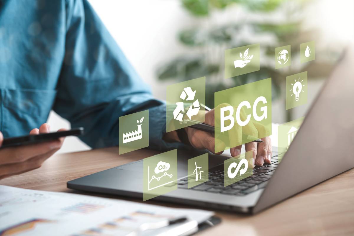 Businessman using computer to study BCG for sustainable economic development. BCG concept, bioeconomy, circular economy, green economy. with an icon on the screen