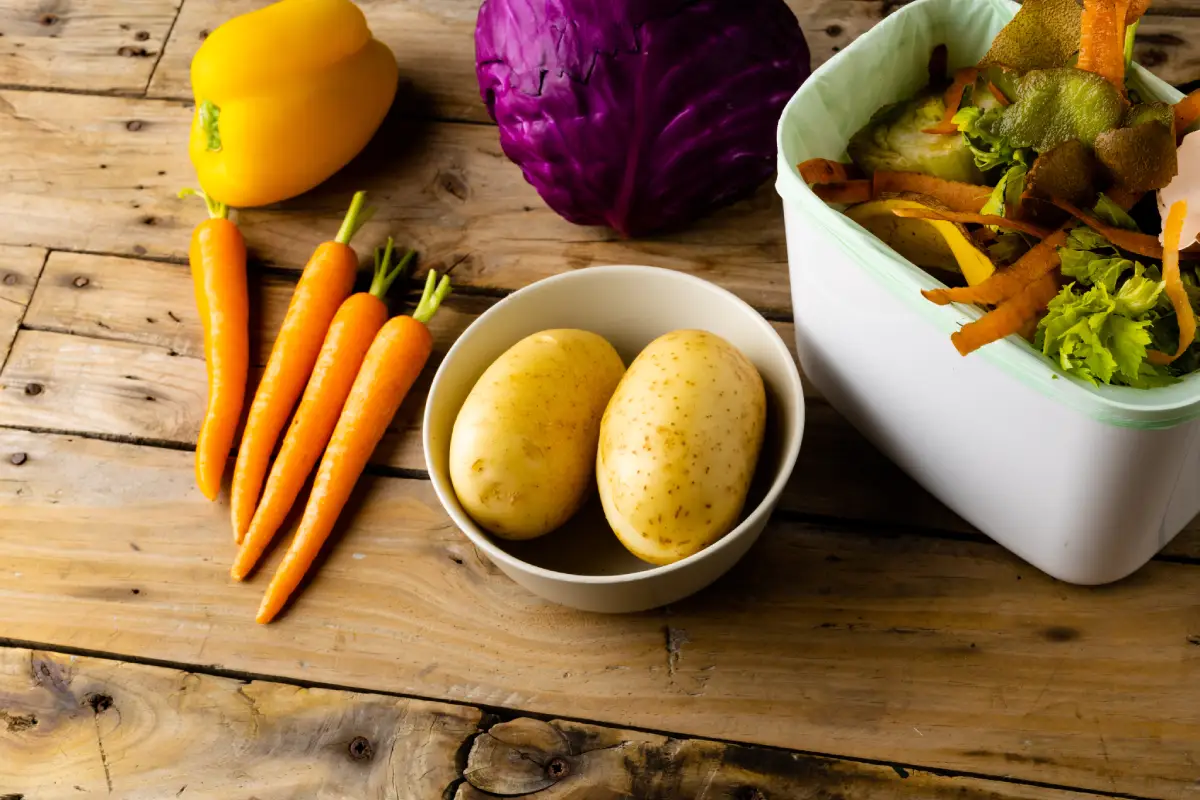Vegetable scraps collected in a kitchen bin